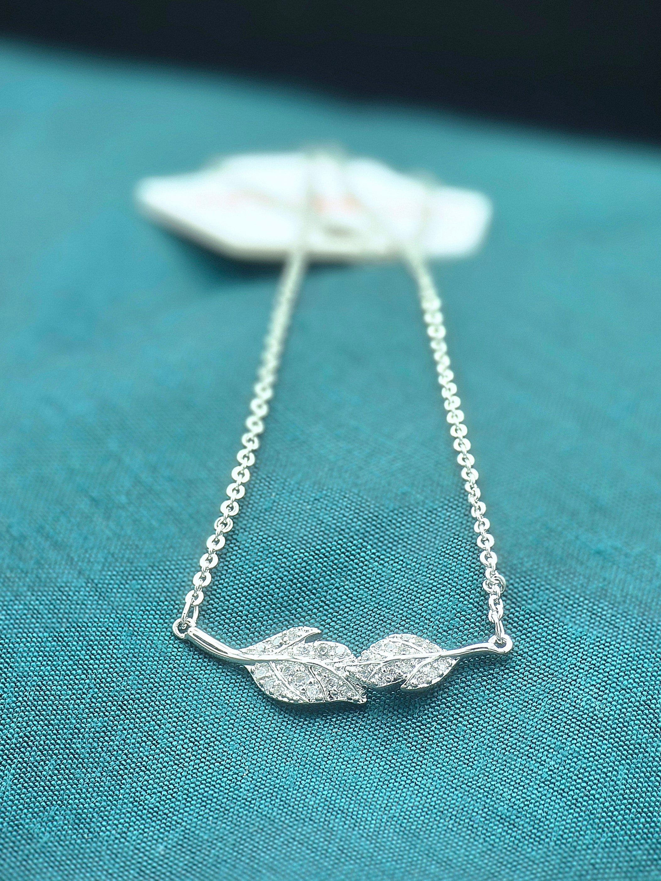 Elegant Twin Leaf Necklace – Silver Crystal Pendant for Women