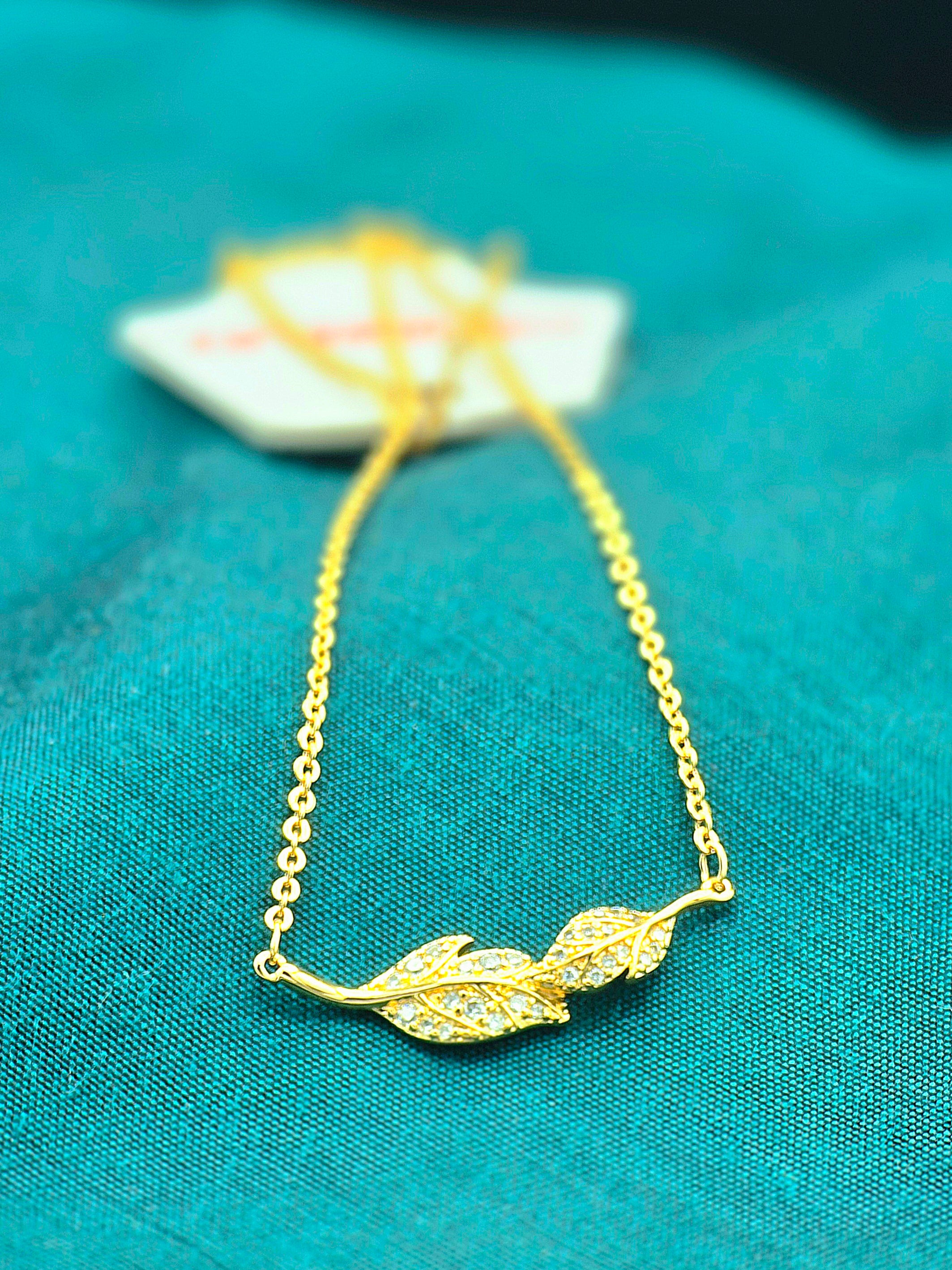 Golden Twin Leaf Necklace – Elegant Crystal Leaf Pendant for Women